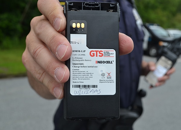 Neocell-GTS-officer Officer holding Neocell battery